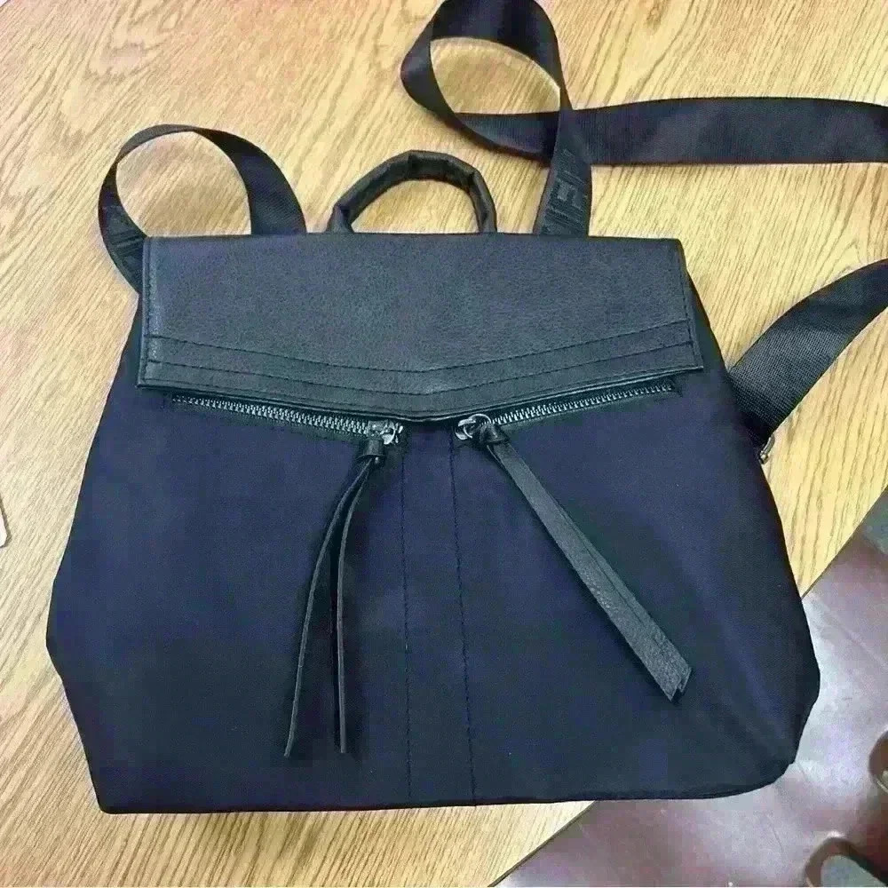 Botkier Womens Faux Leather Trim Flap Back Pack Shoulder Handbag Black. EUC